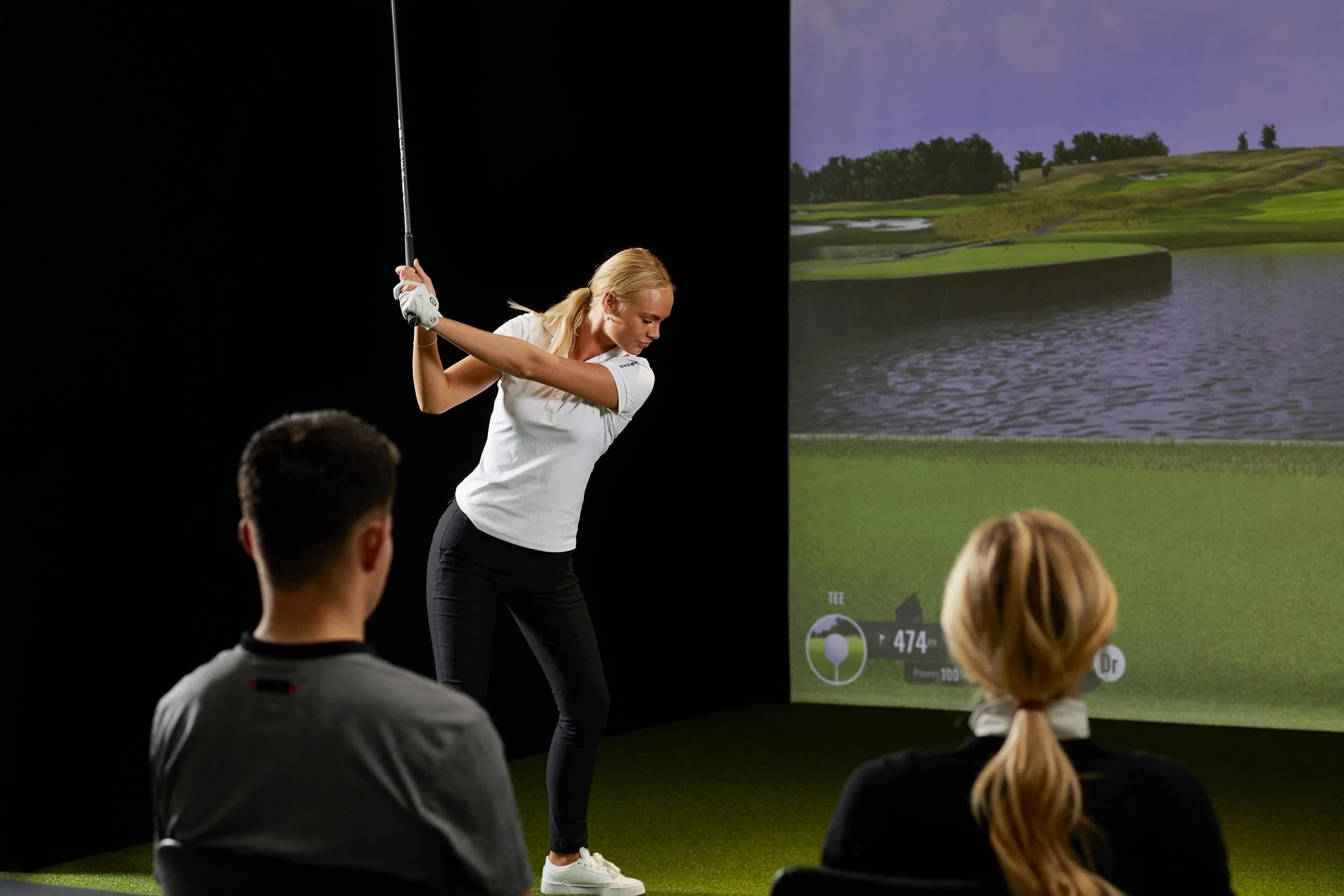 TeeBay indoor golf facility interior Botany Auckland