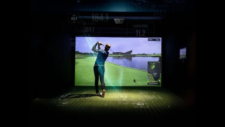 Indoor golf simulator lounge at TeeBay Botany Auckland